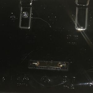 Versace Glossy Black Satchel with Gold Details